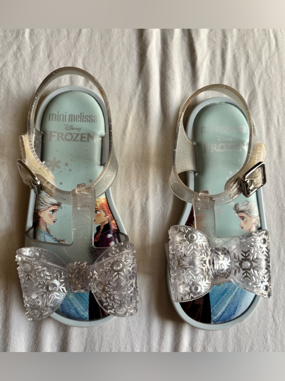 Mini Melissa Clear Glitter Bow Frozen Sandals in Light Blue